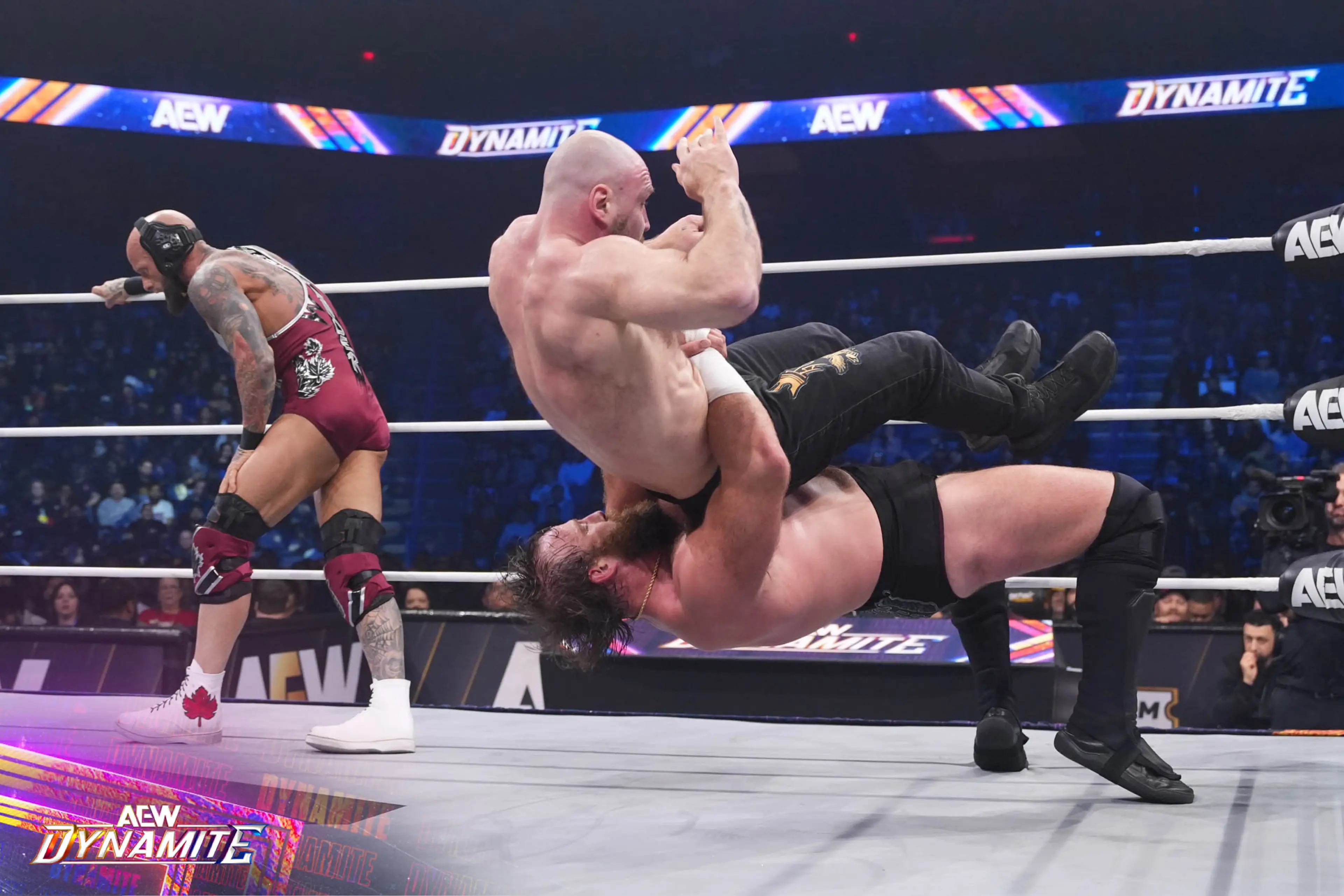 Two fighters at the All Elite Wrestling,  Death Riders vs Callis Family.