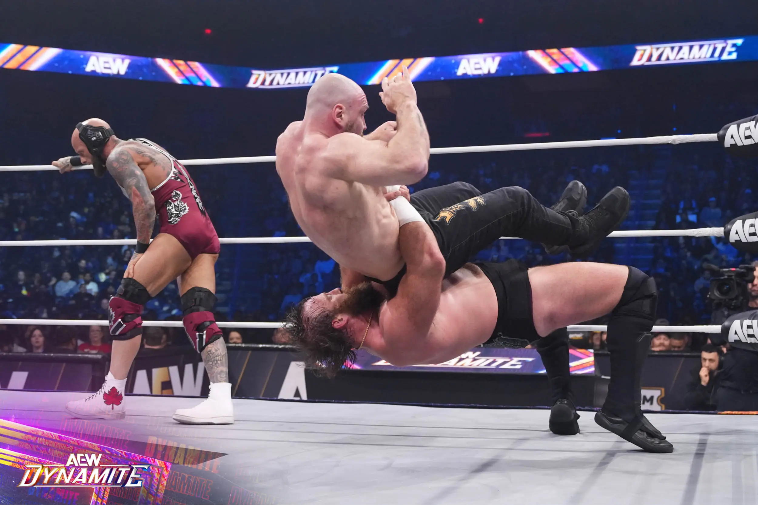 Two fighters at the All Elite Wrestling, Death Riders vs Callis Family.