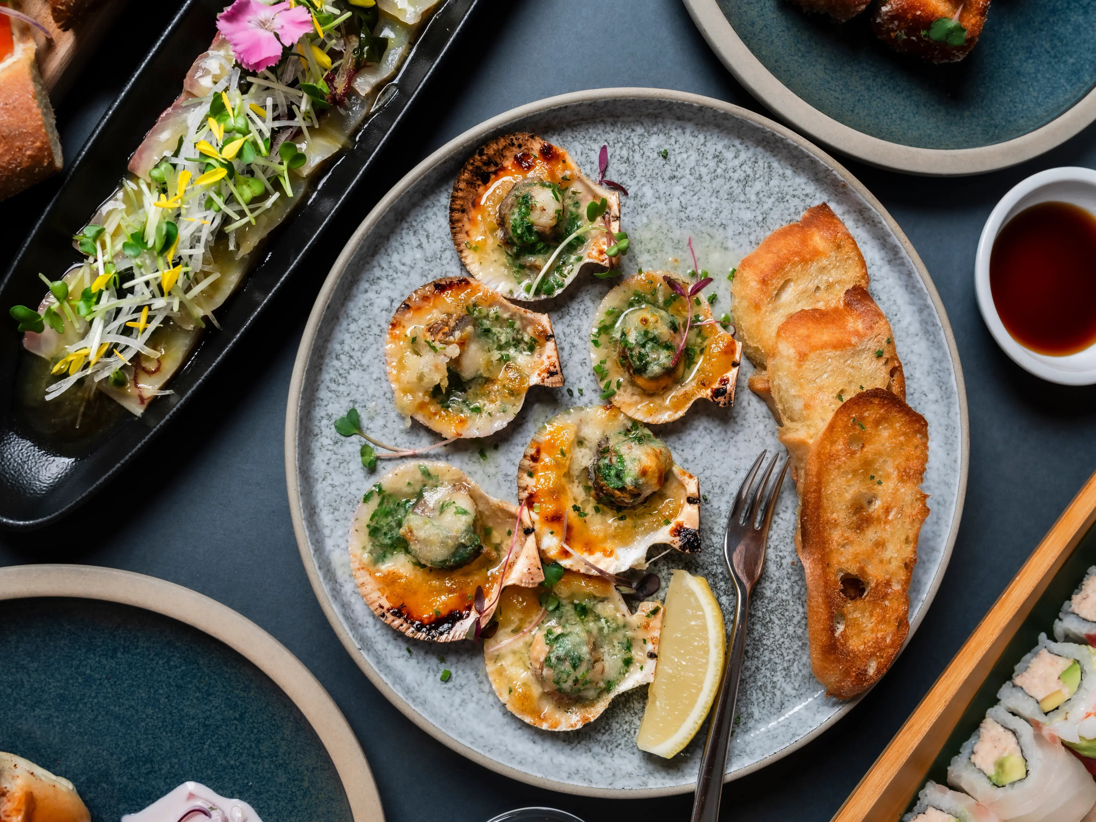 Happy hour dishes at Coast